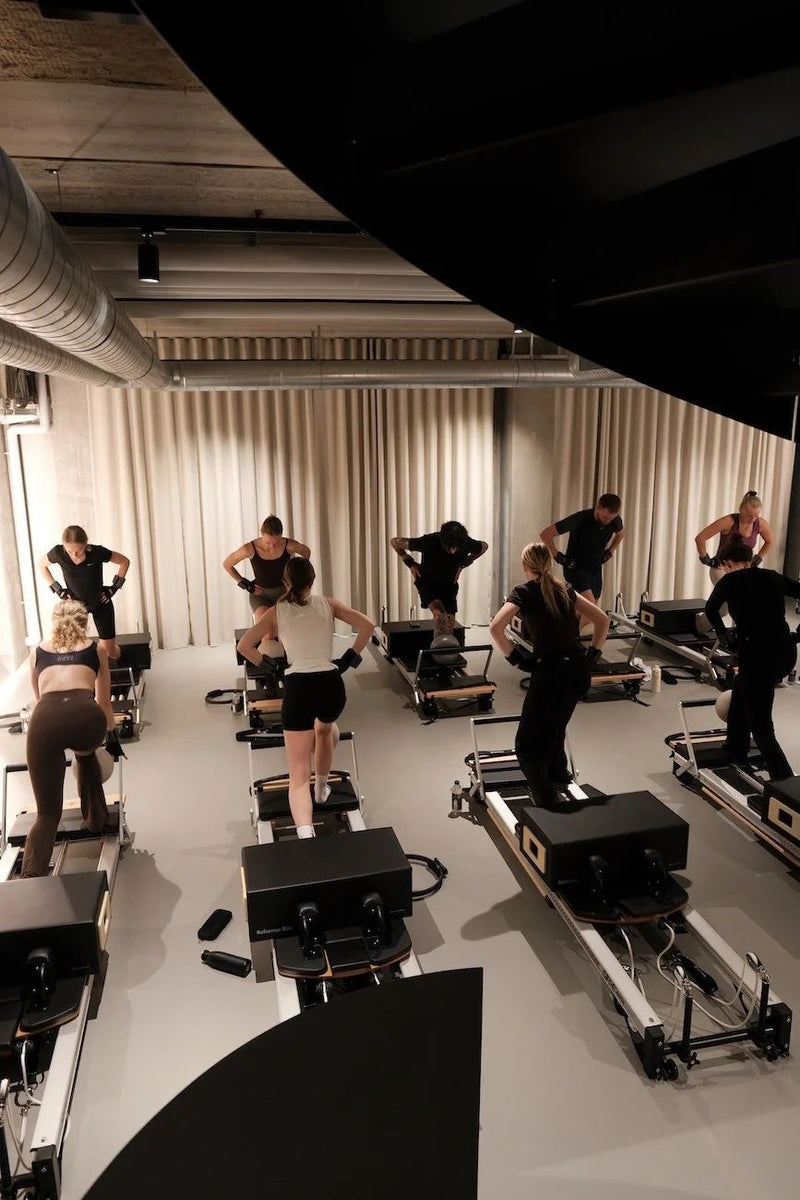 Full reformer Pilates class in the Sink Reformer studio in Aarhus