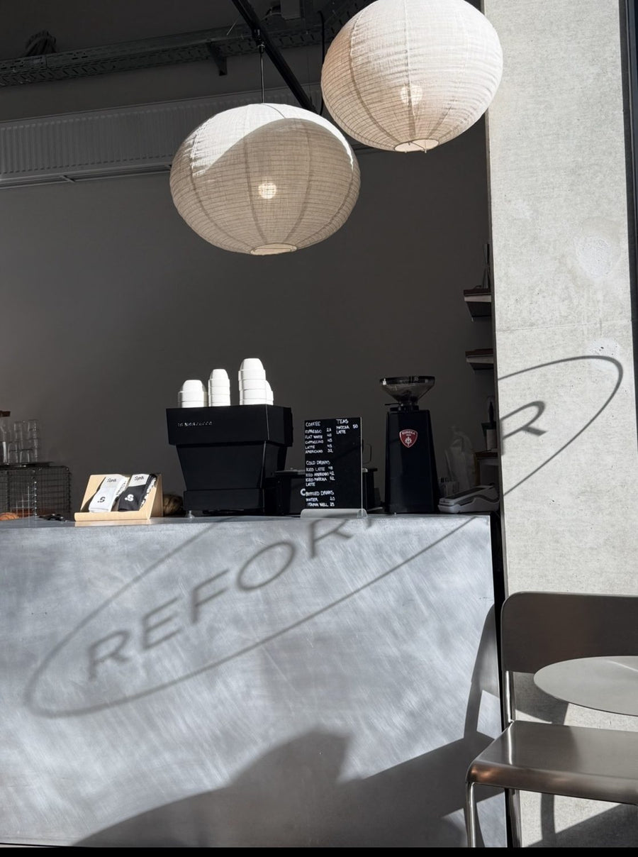Coffee bar with espresso machine, menu board and Sink grip socks at Sink Reformer, Aarhus Ø